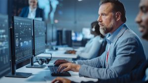 An IT professional working on an IT solutions through a DIR contract