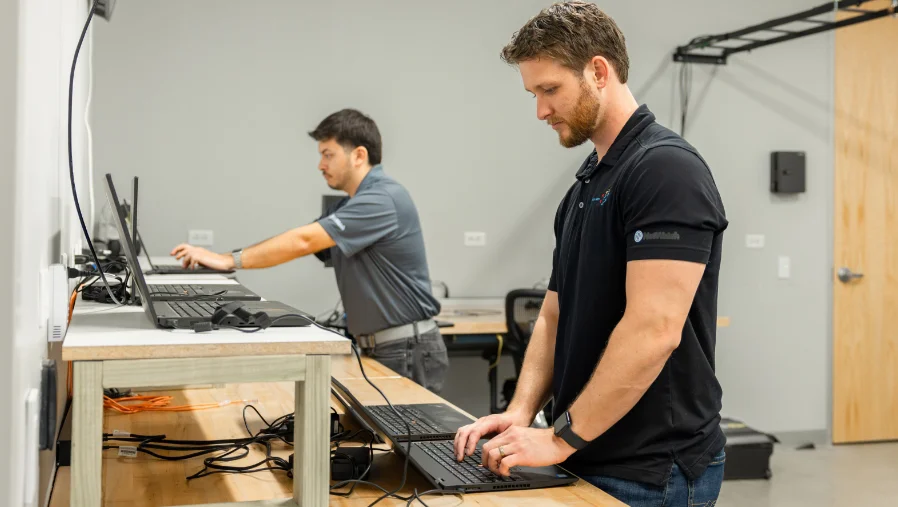 Computer Solutions NetWatch technicians configuring new PCs as part of the City of San Antonio IT procurement program